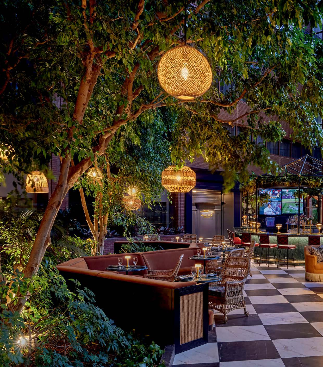 The renovated Omni Charlottesville Hotel atrium with the Conservatory Bar